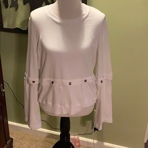 White snap  Removable sleeves and waist